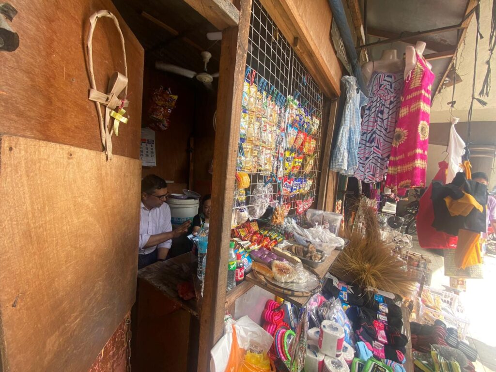 Shubhrendu, Co-Founder & CEO, with a yufin user behind the counter of her sari-sari store