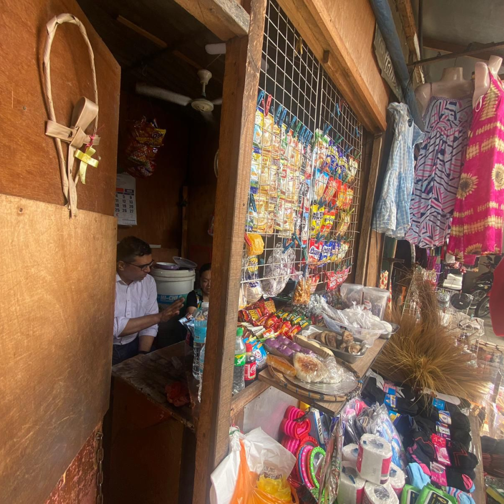 Shubhrendu, Co-Founder & CEO, with a yufin user behind the counter of her sari-sari store