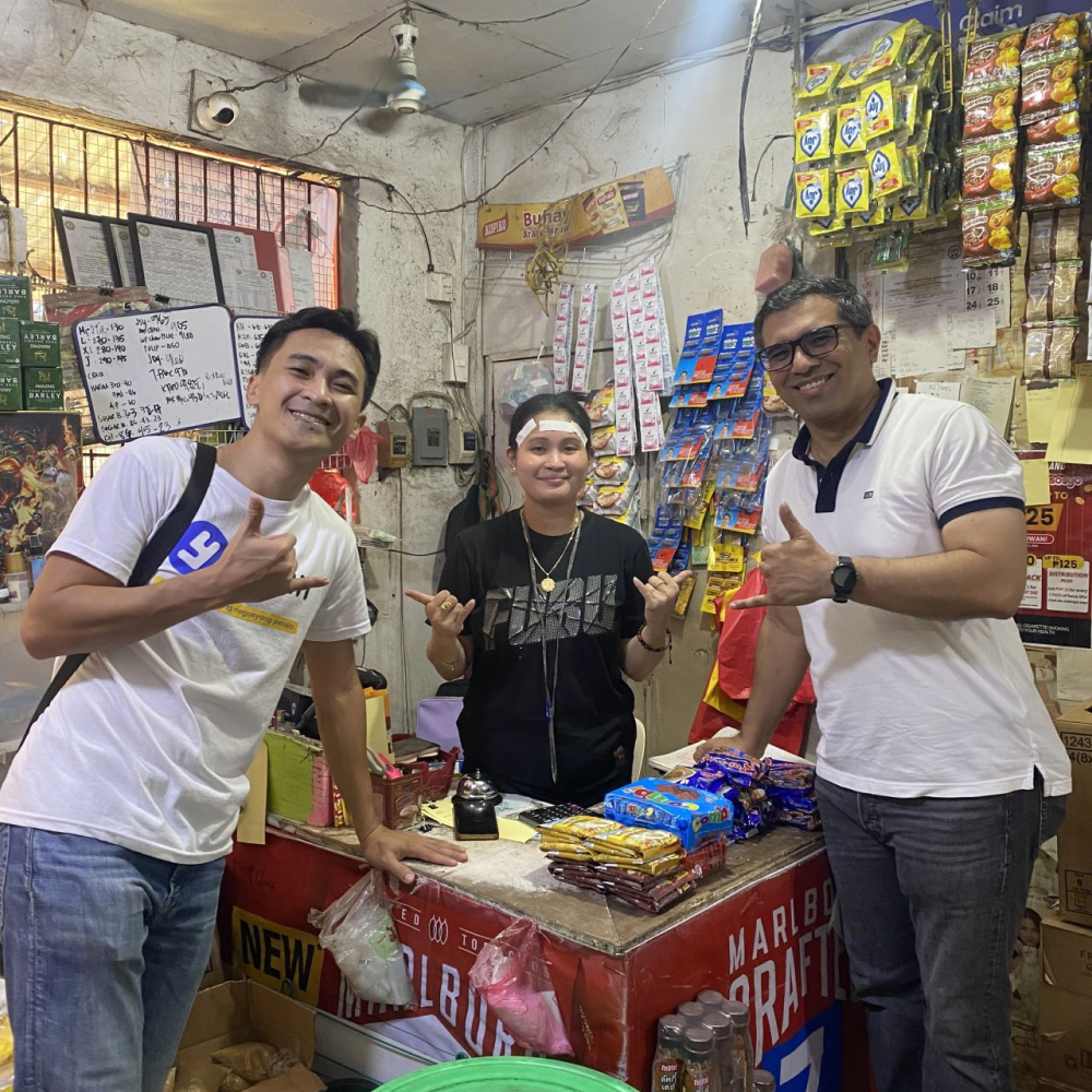 yufin team in the field with a yufin merchant