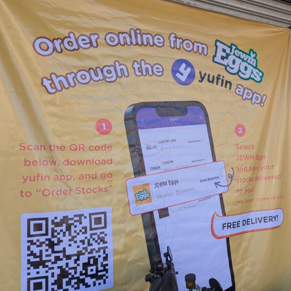 yufin tarpaulin announcing that JEWM Eggs is now in the app.